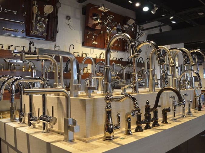 Variety of kitchen sink faucets on display at Green Art Plumbing Supply Freeport NY