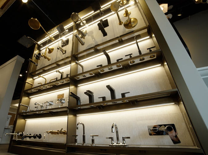 Bathroom faucet display at Green Art Plumbing Supply Freeport