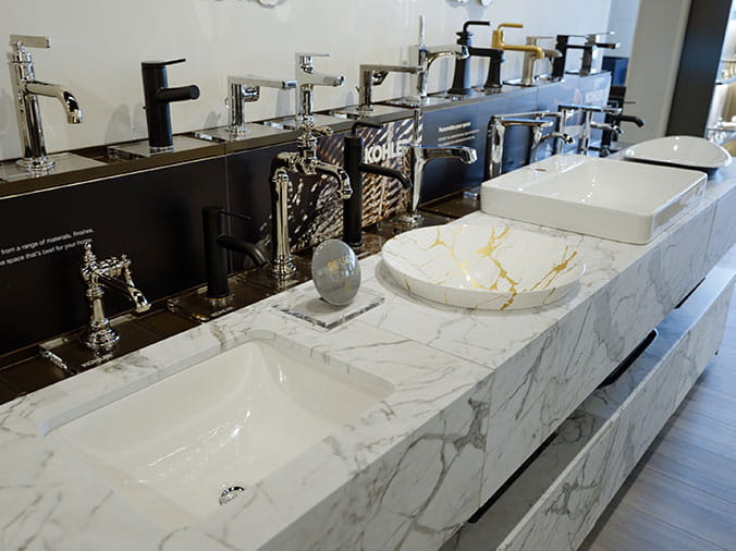 Bathroom sink display at Green Art Plumbing Supply Freeport