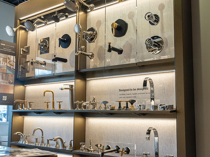Bathroom faucet display at Green Art Plumbing Supply Freeport