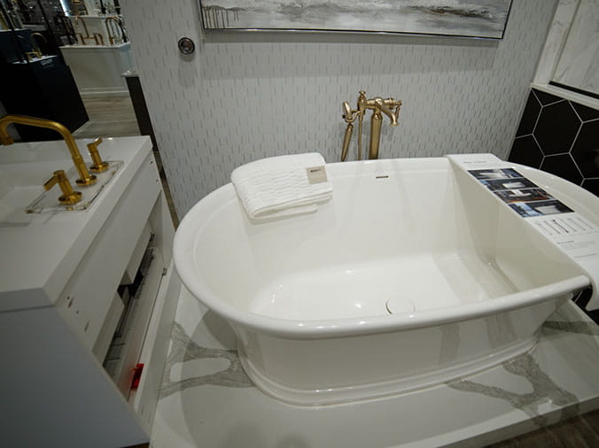 Sample bathroom with free standing bathtub at Green Art Plumbing Supply Freeport NY